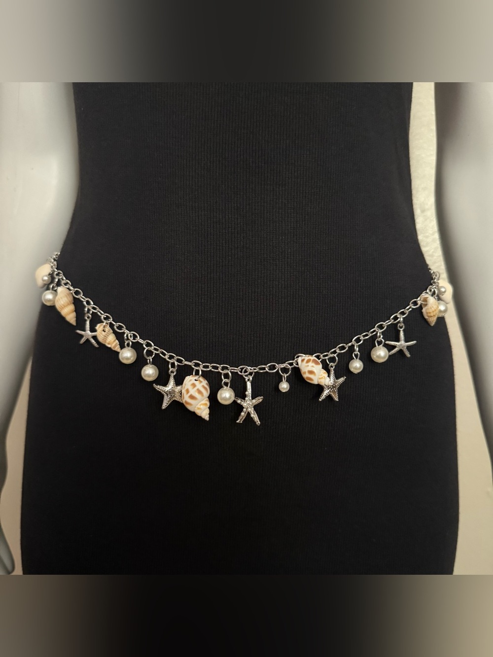 Silver tone skinny chain belt with seashell charms
